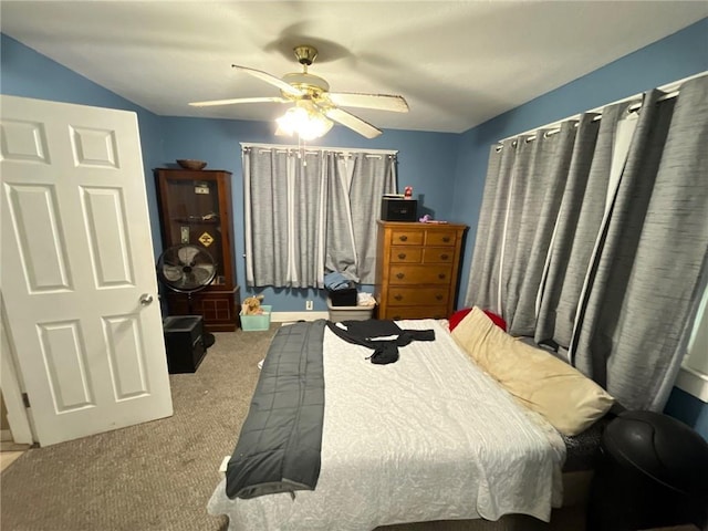 2122 S Scott Ave, Independence, MO 64052 - carpeted bedroom with a ceiling fan