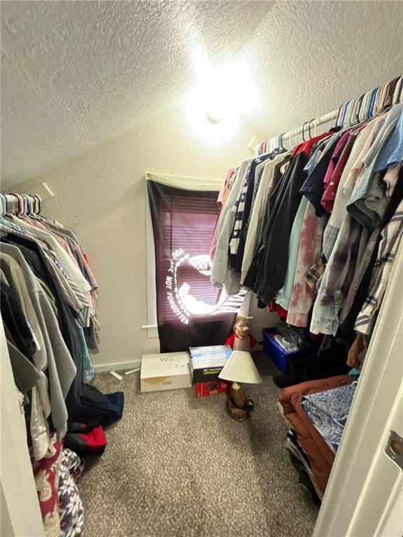 2122 S Scott Ave, Independence, MO 64052 - walk in closet with carpet floors