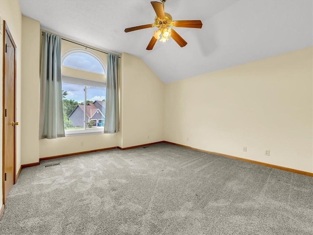 15409 Conser St, Overland Park, KS 66223 - bonus room with carpet floors, vaulted ceiling, and a ceiling fan