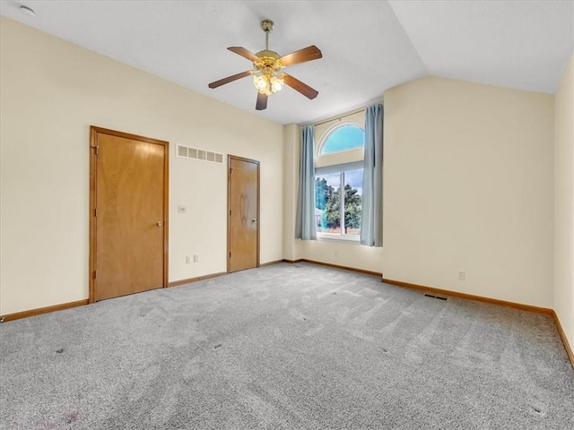 15409 Conser St, Overland Park, KS 66223 - unfurnished bedroom with carpet, lofted ceiling, and a ceiling fan