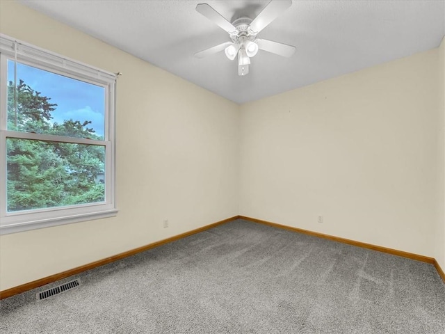 15409 Conser St, Overland Park, KS 66223 - carpeted empty room featuring baseboards and ceiling fan