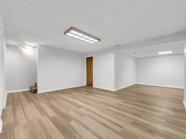 15409 Conser St, Overland Park, KS 66223 - basement with light wood finished floors