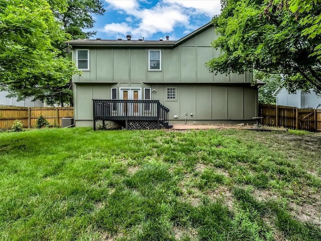 15409 Conser St, Overland Park, KS 66223 - rear view of property featuring a fenced backyard and a deck
