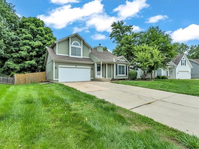 15409 Conser St, Overland Park, KS 66223 - view of front of house with a garage, driveway, a chimney, and a shingled roof