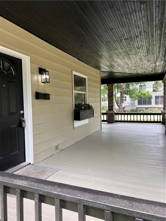 112 N High St, Butler, MO 64730 - view of porch