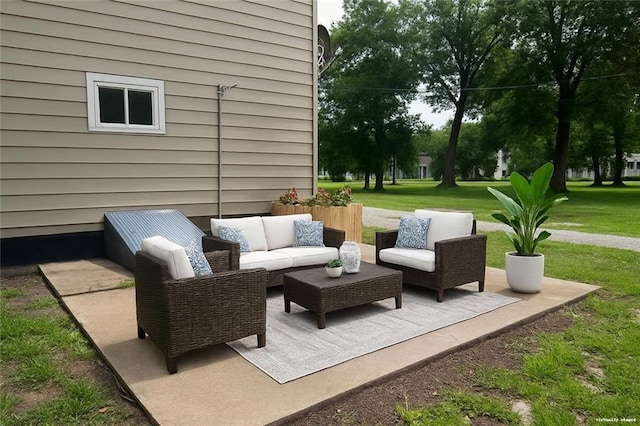 112 N High St, Butler, MO 64730 - view of patio with an outdoor living space