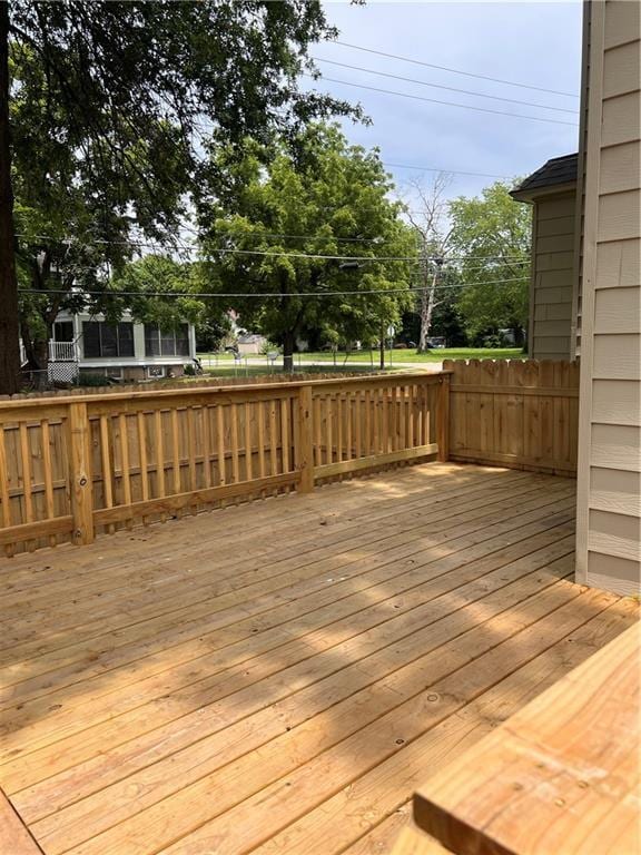 112 N High St, Butler, MO 64730 - view of wooden deck