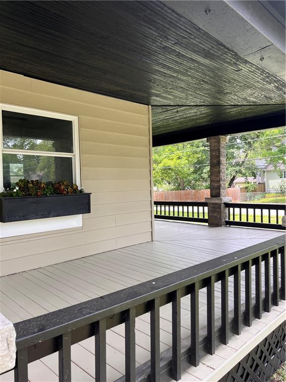 112 N High St, Butler, MO 64730 - view of wooden terrace