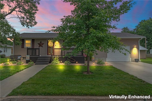 505 S Magdalena St, Concordia, MO 64020 - view of front of property featuring concrete driveway, a porch, a front yard, and an attached garage