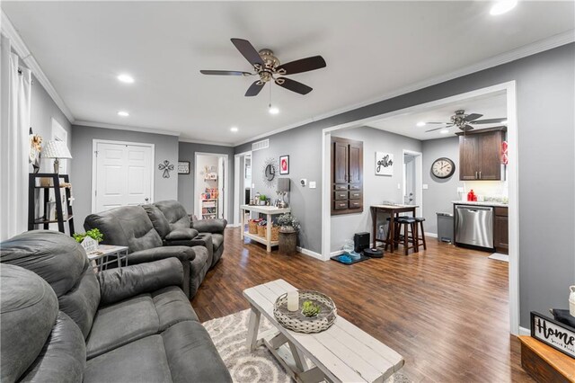 505 S Magdalena St, Concordia, MO 64020 - living room featuring ceiling fan, recessed lighting, crown molding, and dark wood finished floors
