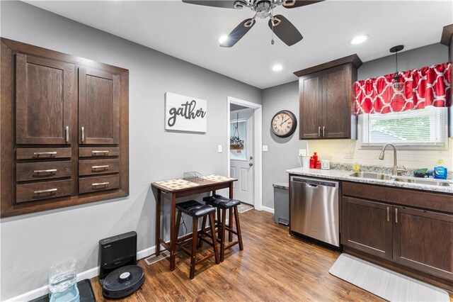505 S Magdalena St, Concordia, MO 64020 - kitchen featuring stainless steel dishwasher, a ceiling fan, dark wood finished floors, dark brown cabinets, and tasteful backsplash