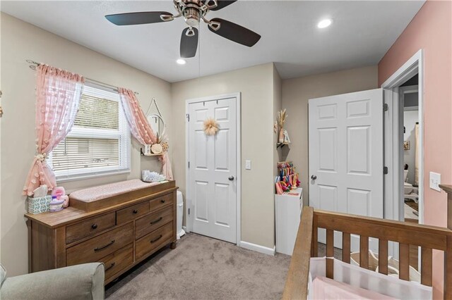 505 S Magdalena St, Concordia, MO 64020 - bedroom with light colored carpet, recessed lighting, and a ceiling fan
