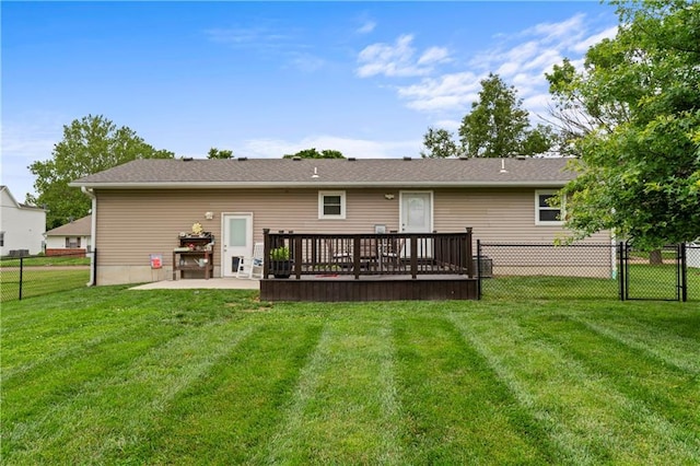 505 S Magdalena St, Concordia, MO 64020 - back of property featuring a fenced backyard, a patio area, and a wooden deck