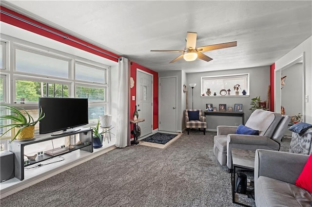 2508 Vernon Ave, Kansas City, KS 66104 - carpeted living area with a ceiling fan