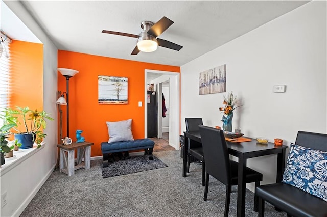 2508 Vernon Ave, Kansas City, KS 66104 - dining room featuring ceiling fan and carpet flooring