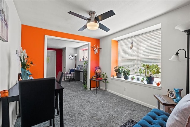 2508 Vernon Ave, Kansas City, KS 66104 - carpeted living room featuring ceiling fan and baseboards
