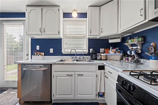 2508 Vernon Ave, Kansas City, KS 66104 - kitchen featuring dishwasher, white cabinets, and gas stove