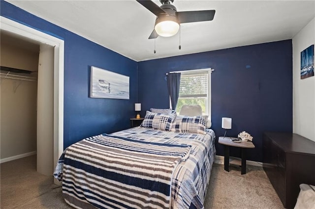 2508 Vernon Ave, Kansas City, KS 66104 - carpeted bedroom with a ceiling fan and a closet