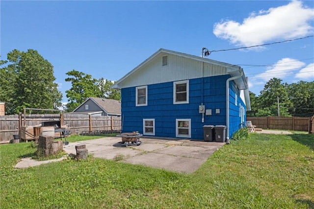 2508 Vernon Ave, Kansas City, KS 66104 - back of house featuring a patio and a fenced backyard