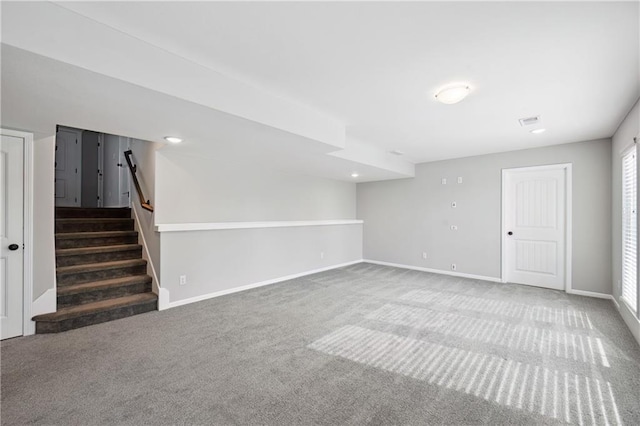 11704 N Laurel Ave, Kansas City, MO 64157 - basement featuring carpet floors and stairway