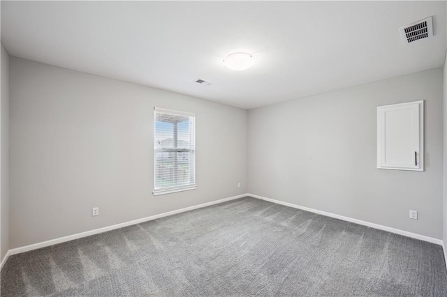 11704 N Laurel Ave, Kansas City, MO 64157 - spare room with carpet flooring