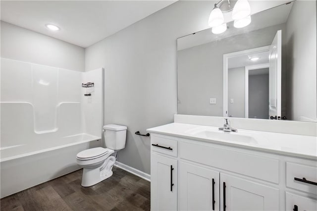 11704 N Laurel Ave, Kansas City, MO 64157 - bathroom with wood finished floors, vanity, and bathing tub / shower combination