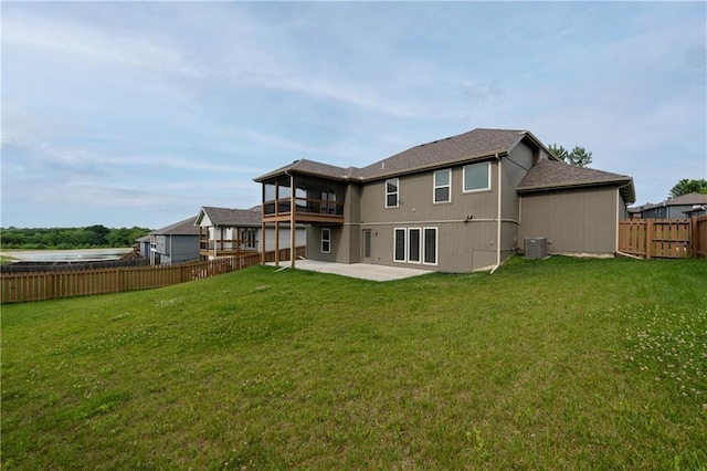 11704 N Laurel Ave, Kansas City, MO 64157 - back of house featuring a patio and a fenced backyard
