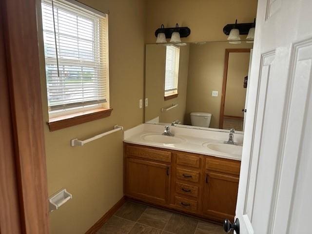 1002 NE Deer Creek Rd, Grain Valley, MO 64029 - full bath featuring toilet and double vanity