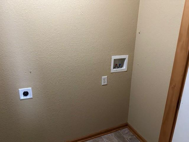 1002 NE Deer Creek Rd, Grain Valley, MO 64029 - laundry room featuring hookup for an electric dryer and washer hookup
