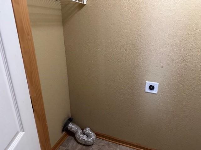 1002 NE Deer Creek Rd, Grain Valley, MO 64029 - laundry room featuring electric dryer hookup and baseboards