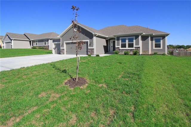 3718 NE 90th Ter, Kansas City, MO 64156 - view of front of house featuring stone siding, an attached garage, and driveway