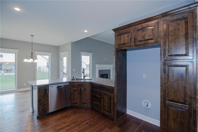 3718 NE 90th Ter, Kansas City, MO 64156 - kitchen featuring dishwasher, a chandelier, dark wood-style flooring, light countertops, and dark brown cabinets