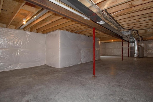3718 NE 90th Ter, Kansas City, MO 64156 - unfinished below grade area featuring heating unit