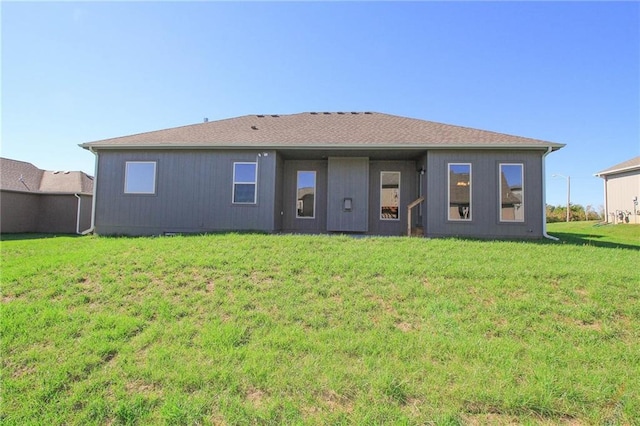 3718 NE 90th Ter, Kansas City, MO 64156 - back of property with a yard