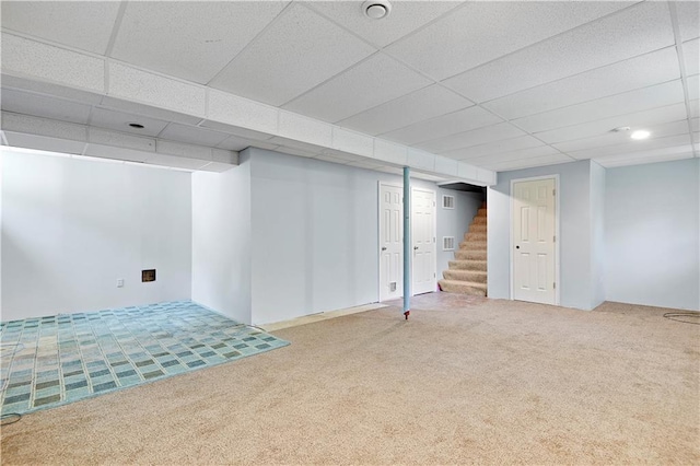 819 N Arroyo Dr, Olathe, KS 66061 - finished basement featuring carpet, stairway, and a paneled ceiling
