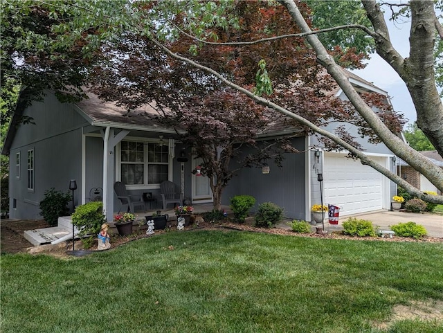 413 Quail Trl, Warrensburg, MO 64093 - view of front of home with covered porch, a front lawn, an attached garage, and concrete driveway