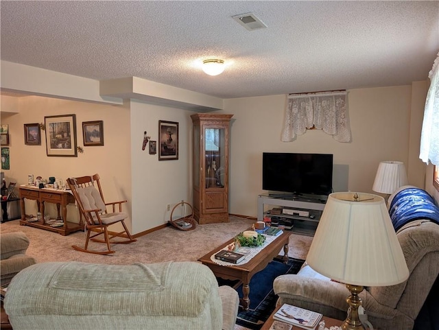 413 Quail Trl, Warrensburg, MO 64093 - carpeted living area featuring a textured ceiling and baseboards