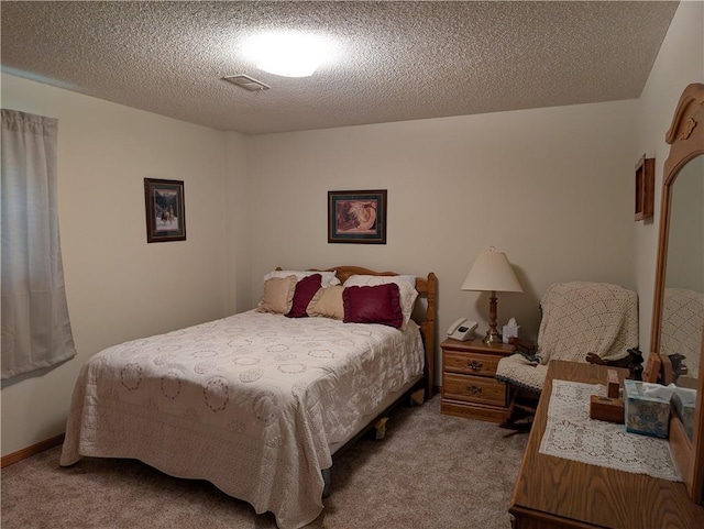 413 Quail Trl, Warrensburg, MO 64093 - carpeted bedroom with a textured ceiling