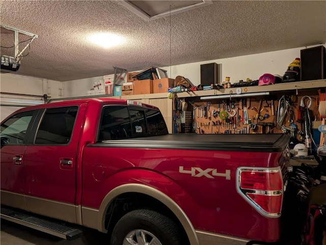 413 Quail Trl, Warrensburg, MO 64093 - garage with a garage door opener