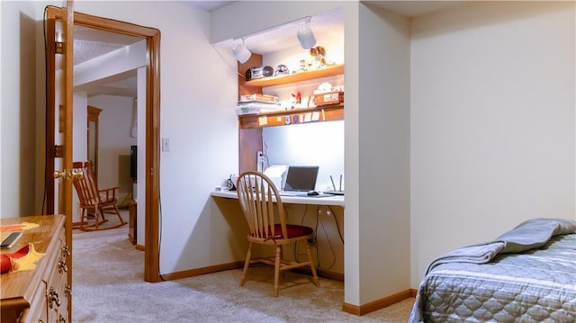 413 Quail Trl, Warrensburg, MO 64093 - bedroom featuring light colored carpet and a desk