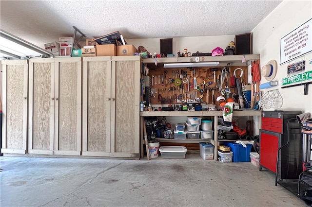 413 Quail Trl, Warrensburg, MO 64093 - garage with a workshop area