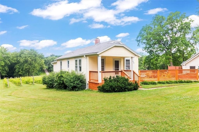 414 Dickinson Rd, Independence, MO 64050 - view of front of house with a chimney