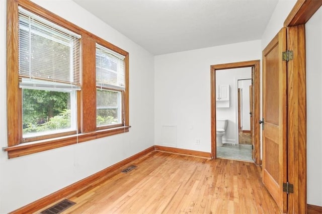 414 Dickinson Rd, Independence, MO 64050 - unfurnished room featuring light wood finished floors and baseboards