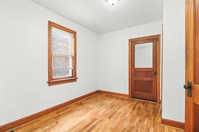 414 Dickinson Rd, Independence, MO 64050 - unfurnished room featuring baseboards and light wood-style flooring