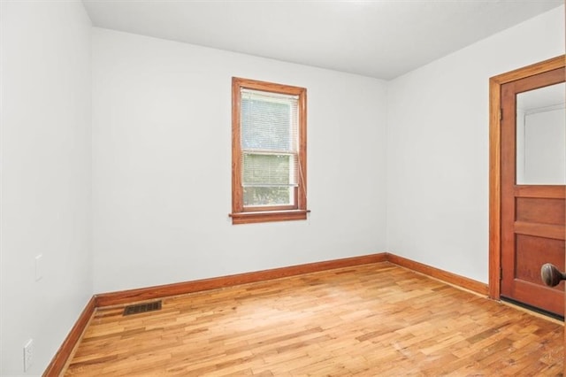 414 Dickinson Rd, Independence, MO 64050 - unfurnished room with light wood finished floors and baseboards