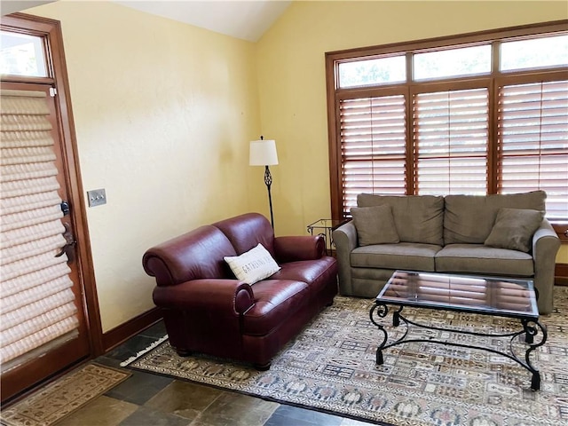 207 W 66th St, Kansas City, MO 64113 - living area with vaulted ceiling and baseboards