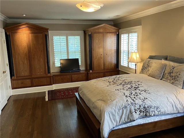 207 W 66th St, Kansas City, MO 64113 - bedroom featuring dark wood finished floors, crown molding, and recessed lighting