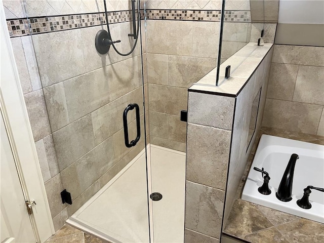 207 W 66th St, Kansas City, MO 64113 - full bathroom with a stall shower and a bath