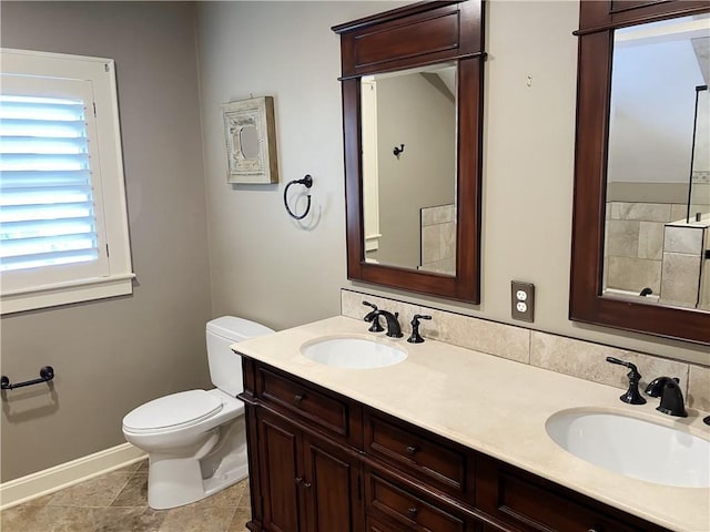 207 W 66th St, Kansas City, MO 64113 - bathroom with double vanity and tile patterned flooring