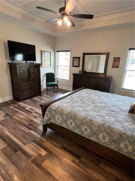2321 Dovecott Dr, Kearney, MO 64060 - bedroom featuring dark wood finished floors, ornamental molding, multiple windows, and a ceiling fan
